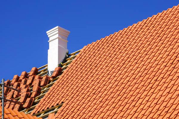 Understanding Warranties and Guarantees in Roof Replacement